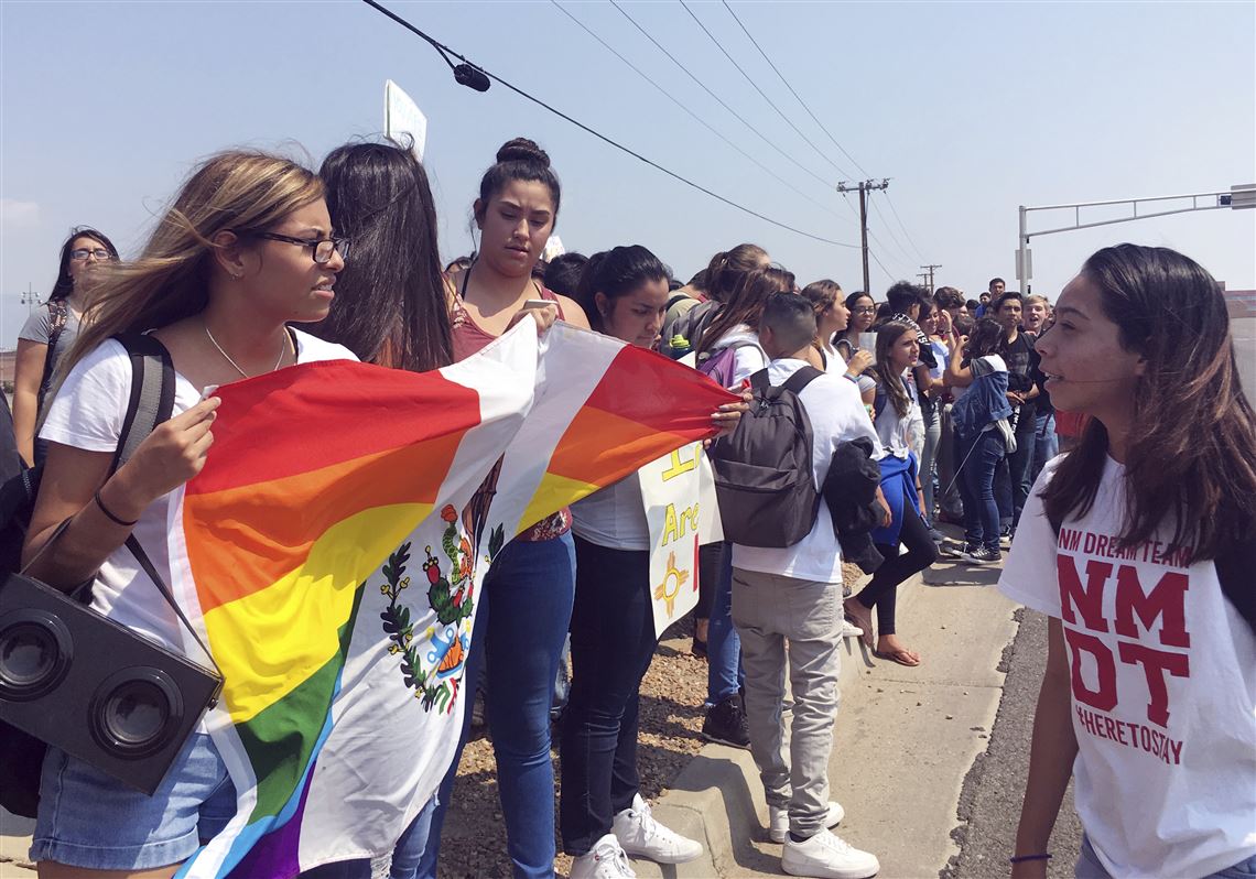 In this Sept. 5 file photo, Albuquerque High School students rally outside of campus in Albuquerque, N.M., after walking out of class to protest the Trump's administration's decision to end Obama-era immigrant protections.