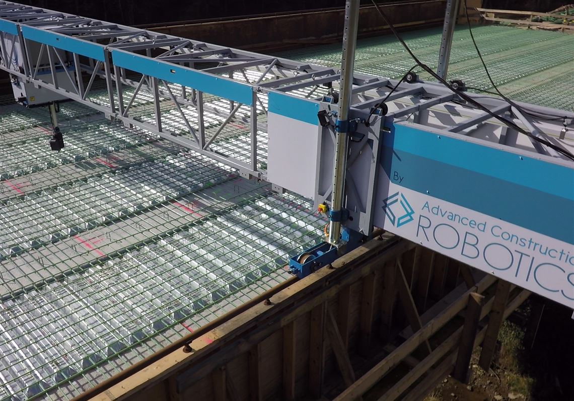 A machine known as Tybot, a robot that ties wires around rebar frames so laborers don't have to do the monotonous work. It was developed by Advanced Construction Robotics Inc. of Allison Park.