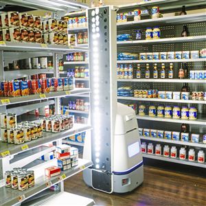 A robot made by Bossa Nova Robotics checks inventory in a mockup Wal-Mart aisle at the company's test lab in the Strip District.  