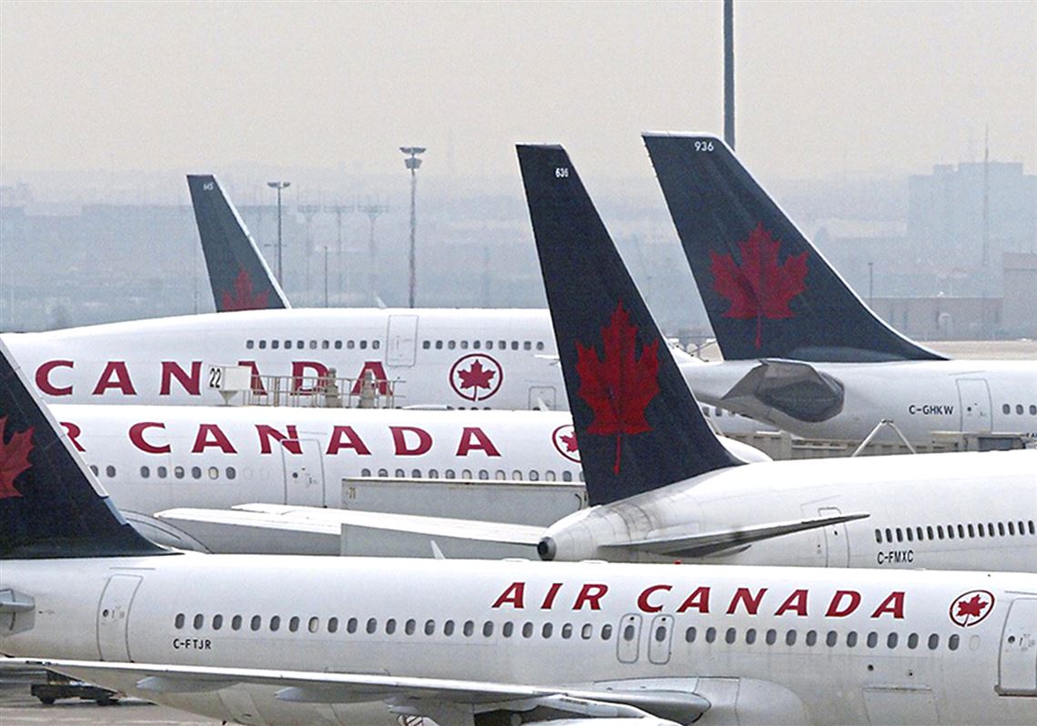 In this April 2003 file photo, an Air Canada plane sits on the tarmac at Pearson International Airport in Toronto. 