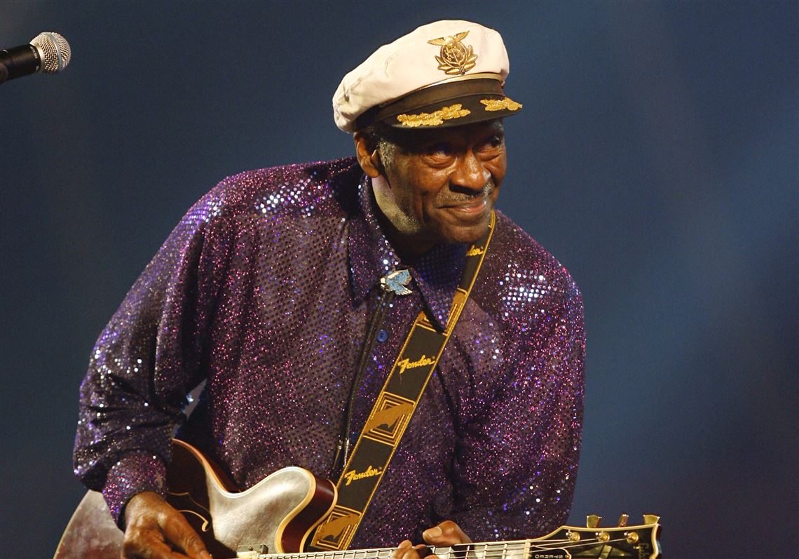FILE - In this Nov. 25, 2007 file photo, legendary U.S. rock and roll singer and guitarist Chuck Berry performs in Burgos, Spain. Rock 'n' roll founding father Berry was among the notable figures who died in 2017. (AP Photo/Israel Lopez Murillo, File)