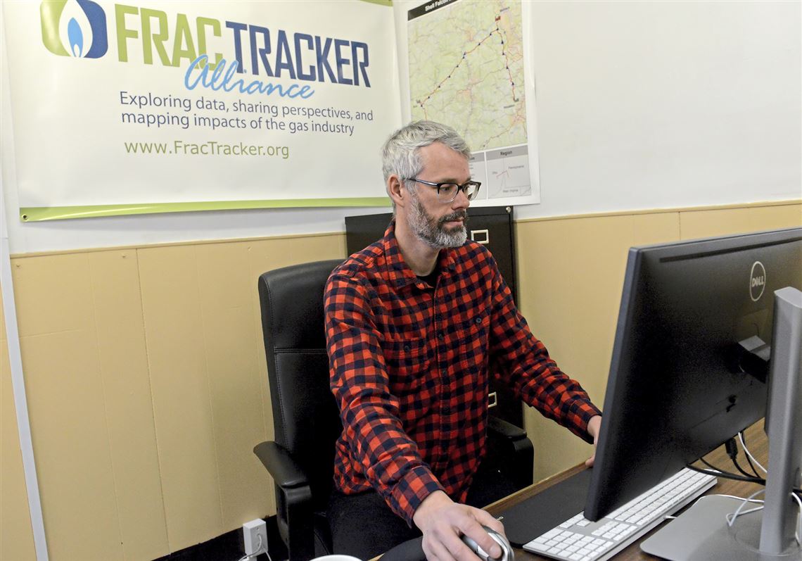 Kirk Jalbert of FracTracker Alliance in his office in Millvale. Mr. Jalbert found data on oil and gas projects and disseminate it to activist groups who are trying to stop or weigh in on certain projects. 