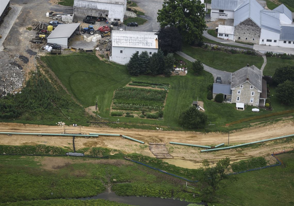 In this July 2017 photo, pipes for the Sunoco Mariner East pipeline are placed in South Lebanon Township, Pa. 