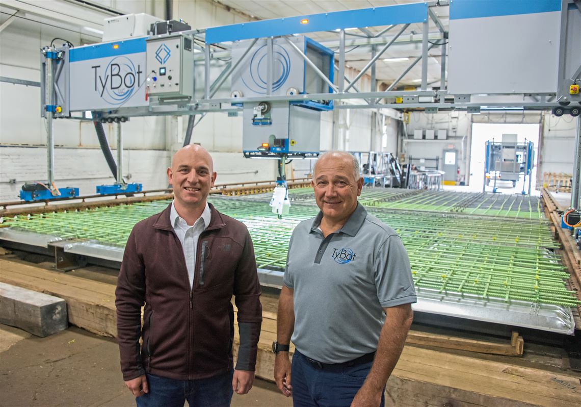 Vice President Jeremy Searock, left,  and CEO Stephen Muck of TyBot LLC are pictured on Wednesday, April 25, 2018 in Allison Park. The company makes industrial robots for use in construction work.
