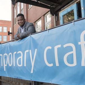 Corey Carrington, the Society for Contemporary Craft’s first Emerging Black Arts Leader, poses for a photo in front of the Society for Contemporary Craft building in the Strip District on September 16, 2016.