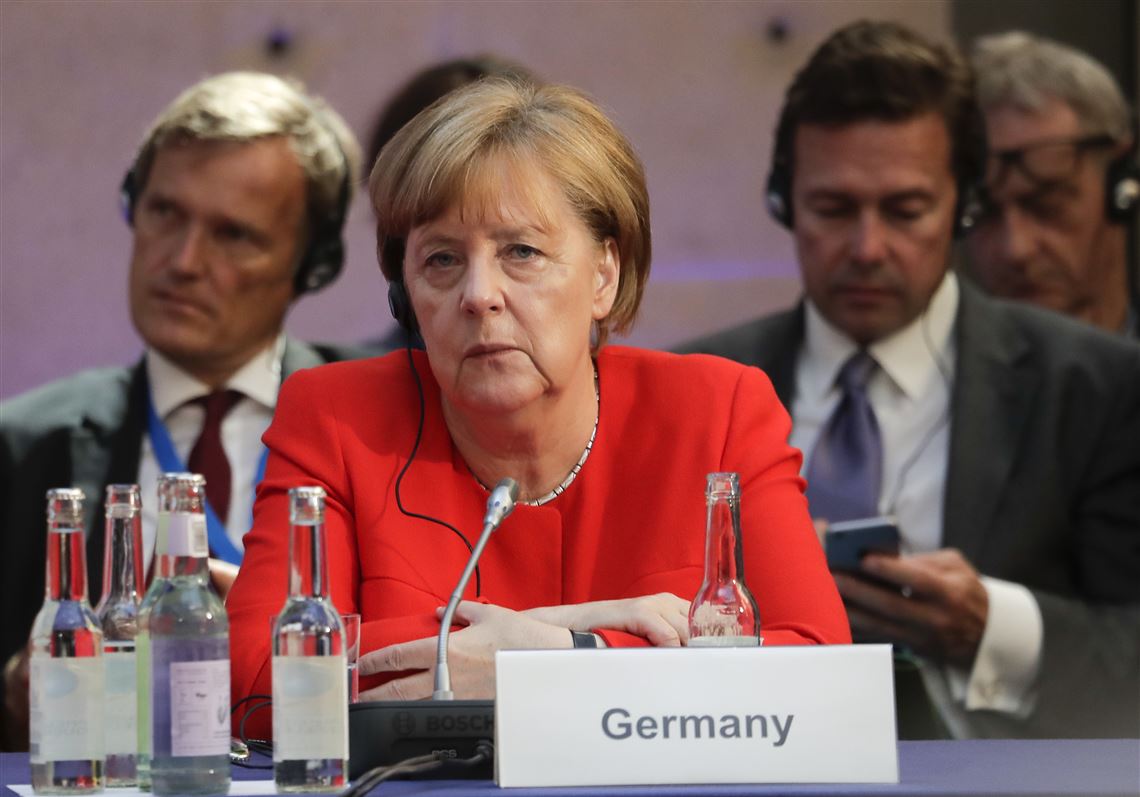 German Chancellor Angela Merkel attends a meeting  in Berlin, Tuesday, June 19, 2018, which prepares a climate change conference that takes place later this year in Poland's city Katowice. (AP Photo/Markus Schreiber, Pool)