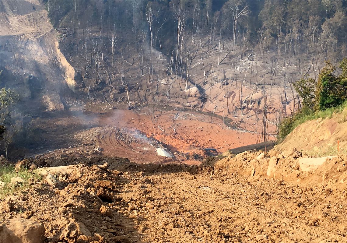 The aftermath of a June 7 pipeline explosion in Marshall County, W. Va. Pipeline operators Columbia Gas Transmission told regulators that a landslide was the apparent cause. 