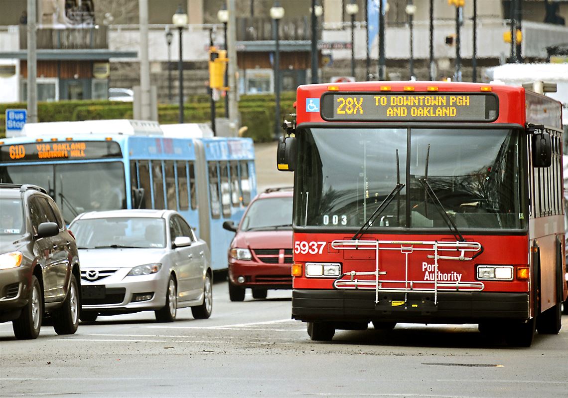 A PAT bus travels on Forbes Avenue in Oakland. 