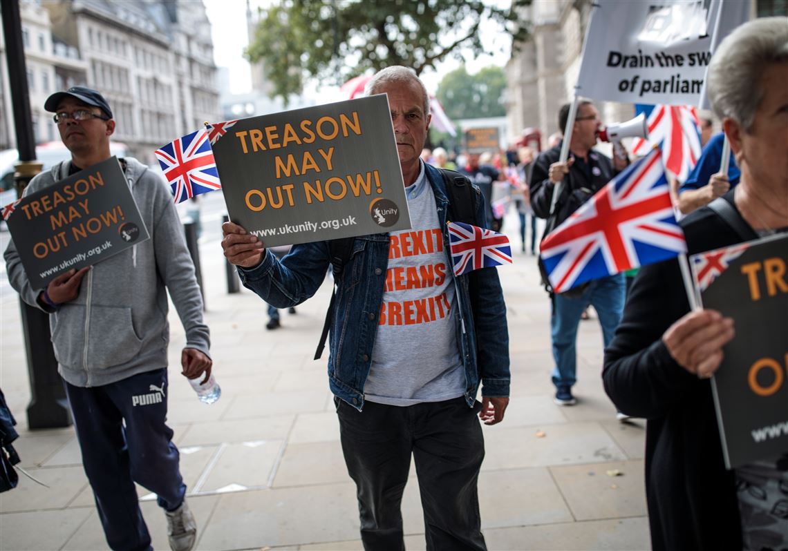 Protesters demonstrate against Prime Minister Theresa May's Chequers plan for Brexit outside the gates of Downing Street on Sept. 5, 2018, in London.