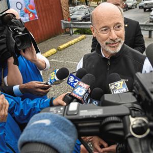 Gov. Tom Wolf talks to the media after voting at his polling station, Tuesday, Nov. 6, 2018, the Eagle Fire Company in Mt. Wolf.