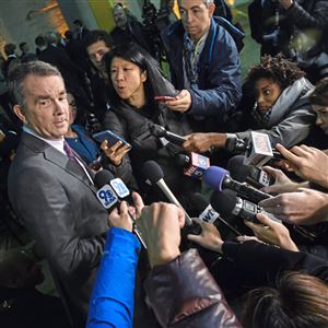 Members of the media ask questions of Virginia Gov. Ralph Northam after he officially announced that Amazon, Inc. will build one of two of its new major headquarters in the state on Tues. Nov. 13, 2018, in the Crystal City area of Arlington, Va. 