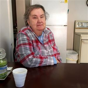 Sandee Keith, 72, of Donora sits in her chilly kitchen Sunday during the gas outage. Ms. Keith was one of 1,700 customers whose gas was shut off Saturday after a contractor 