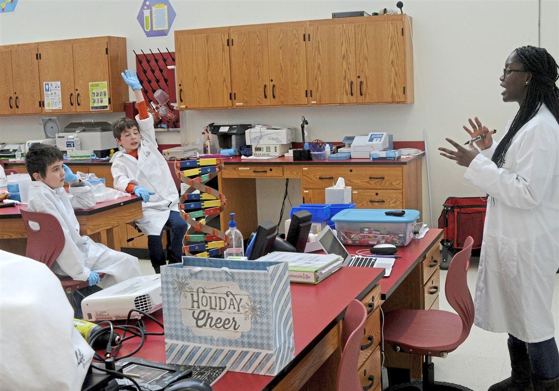 Cynthia Thomas, right, lab technician at the Citizen Science Lab, teaches home-schooled students at the Energy Innovation Center Monday, Jan. 28, 2019 in the Hill District. 
