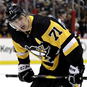 Pittsburgh Penguins' Evgeni Malkin prepares to take a face-off during an NHL hockey game against the New Jersey Devils in Pittsburgh, Monday, Jan. 28, 2019. 