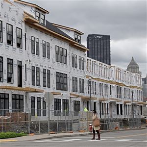 The construction site of the Strip District Brownstones along Waterfront Place from the 21st Street intersection, Tuesday, May 14, 2019, in the Strip District neighborhood of Pittsburgh.