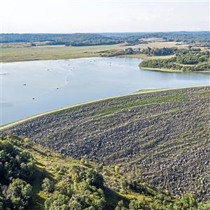 Little Blue Run, the nation's largest coal ash impoundment, can be seen from this photo taken from a drone on on Wednesday, Sept. 19, 2018, in Lawrenceville, W.Va. The site sprawls 955 acres in Beaver County and Hancock County, W.Va. (Andrew Rush/Post-Gazette)