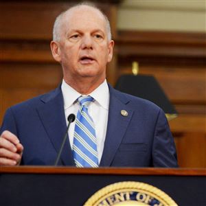 David Hickton, then U.S. Attorney for the Western District of Pennsylvania, in a 2016 file photo. Mr. Hickton will lead a task force examining potential bias in algorithms. Behind him is Mark Nordenberg, chancellor emeritus of the University of Pittsburgh. (Pam Panchak/Post-Gazette)