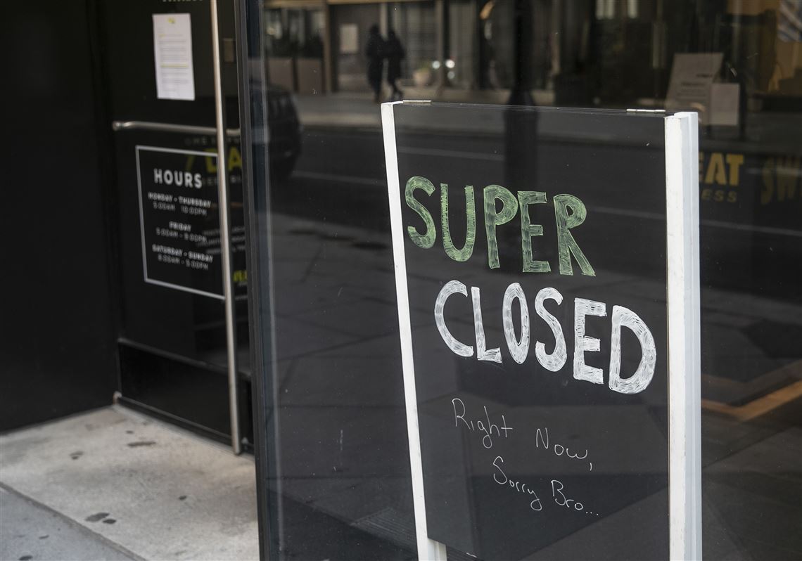 A sign of closure is seen inside Sweat Fitness in Center City, Philadelphia on Saturday, March 21, 2020. Gov. Tom Wolf called for the closure of all businesses that are not "life-sustaining," due to the spread of the coronavirus.