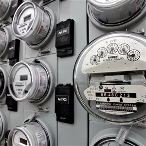 In this May 2009 photo, watt-hour meters track electricity used by residents of an apartment building.