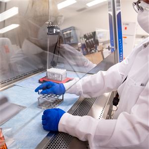 Samantha Kappel, a worker in CMU's COVID test lab, works with samples. The school said it will offer weekly COVID-19 tests to everyone coming to campus this spring, and results will be available in two to three business days, using a lab established by CMU and a testing strategy developed using campus expertise in areas from biology and engineering to robotics.