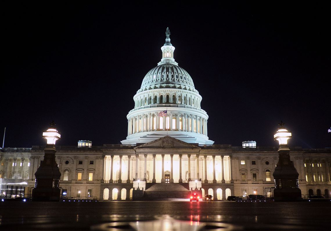 The U.S. flag flies above the Senate chamber at the Capitol in Washington.