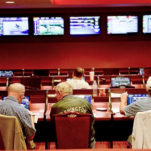 Most people that bet on horse racing stay indoors and watch from television screens like at the Meadows Casino in North Strabane above Wednesday, Sept. 9, 2015.  