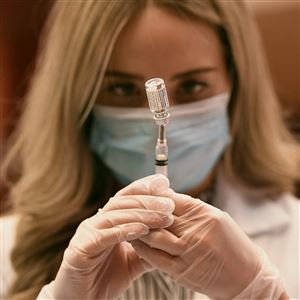 In this March 3, 2021, file photo, pharmacist Madeline Acquilano draws a syringe of Johnson & Johnson COVID-19 at Hartford Hospital in Hartford, Conn. 