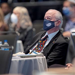 Rabbi Jeffery Myers of the Tree of Life Synagogue listens to Major Elliot Garrett — chief Washington correspondent for CBS News — during the Eradicate Hate Global Summit at the David L. Lawrence Convention Center, Downtown, on Wednesday, Oct. 20, 2021.