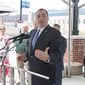 McKeesport Mayor Michael Cherepko addresses the crowd  during the reopening of the McKeesport Transit Center after a $4.4 million refurbishing to expand parking and add four bus shelters with benches, two ticket vending machines and improved access to the Great Allegheny Passage Trail at the site Thursday, March 17, 2022, in McKeesport. The project also will feature wider bus lanes, an underground stormwater management basin and a relief building for employees.