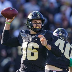 Purdue quarterback Aidan O'Connell throws against Michigan State during an NCAA college football game in West Lafayette, Ind., Nov. 6, 2021.