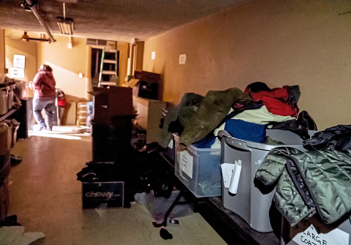 Donated coats are seen in bins at Pittsburgh Mercy's Operation Safety Net. 