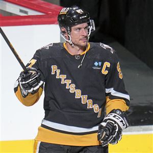 Pittsburgh Penguins' Sidney Crosby is announced as the No. 1 star of the game after the team's 2-1 shootout win over the Carolina Hurricanes in an NHL hockey game in Pittsburgh, Thursday, Dec. 21, 2023.