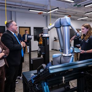 The Community College of Allegheny County hosted a visit from Acting Secretary of Labor Julie Su, left, and Secretary of Education Miguel Cardona, second from left, on Tuesday, Jan. 30, 2024. They toured a robotics class in the new Center for Education, Innovation, and Training building. Students from River Valley Steam Academy watch at right. 