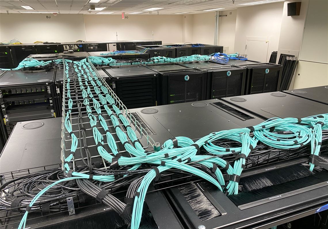 Rows of computers line the Pittsburgh Supercomputing Center in Oakland. Developers are chasing deals to build more data centers in Pennsylvania to power the artificial intelligence revolution.