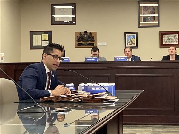 Rep. Tarik Khan, D-Philadelphia, speaks on Monday in a committee meeting in the state Capitol about his bill that seeks to banish artificial intelligence-created misrepresentations of political candidates.