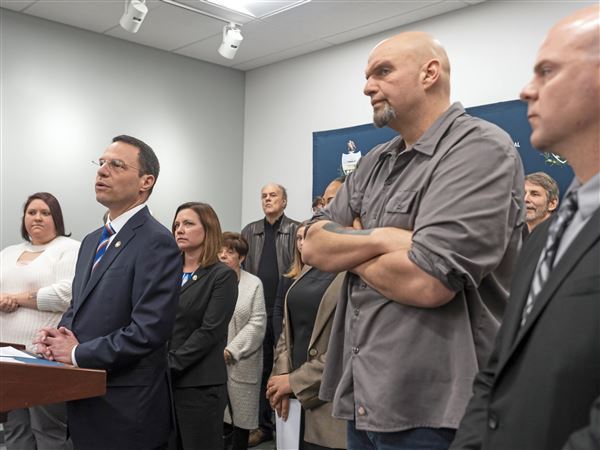 Aides to U.S. Sen. John Fetterman, right, reportedly have expressed concerns about Gov. Josh Shapiro, left, who is on the short list of potential Democratic vice-presidential nominees.