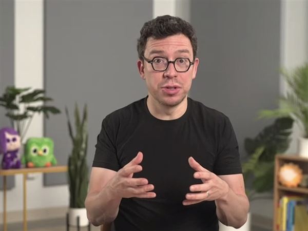 Duolingo Chief Executive Luis von Ahn speaks with shareholders on Wednesday. The East Liberty software company continues to turn a profit from its engaging language lessons and is leaning into artificial intelligence to teach more advanced English.