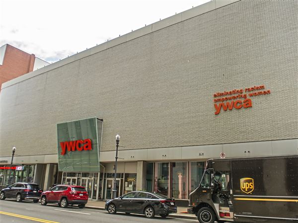 Outside of the YWCA of Greater Pittsburgh on Wood Street, Friday, July 2, 2021, in Downtown. A Detroit developer has made major progress in its bid to erect a 20-story apartment tower on top of the YWCA building.
