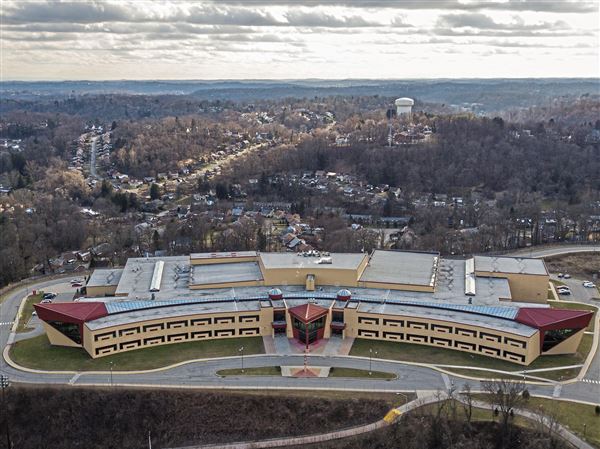 Penn Hills High School can be seen in this aerial photo taken on Friday, Feb. 8, 2019, in Penn Hills. Penn Hills School District has been driven to the brink of financial collapse through its borrowing to build two schools with state-of-the-art features nearly a decade ago. It is now approximately $172 million in debt and in the beginnings of state-ordered financial recovery status. (Andrew Rush/Post-Gazette) 