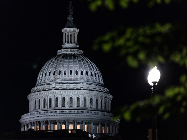 The U.S. Capitol in Washington. Markets came under pressure Monday as investors dumped stocks, U.S. bonds and the dollar, after the United States lost its triple-A bond rating.