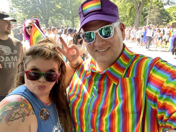 Missy Moreno and Ricky Campbell, a costume shop manager in the University of Pittsburgh’s theatre arts department. At Pride Fest 2021, he wore a shirt he made himself.