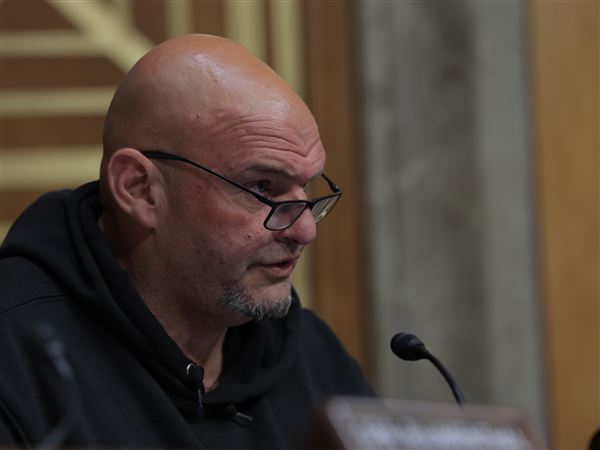 Sen. John Fetterman, D-Pa.,  speaks during a hearing with the Senate Committee on Homeland Security and Governmental Affairs on Capitol Hill on Tuesday in Washington. 