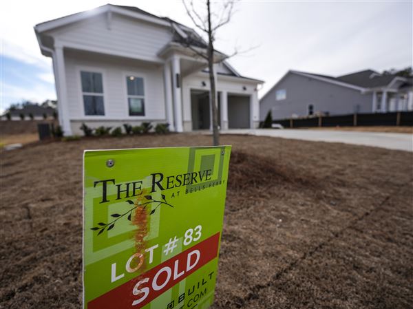 A sign announces the sale of a new home, Jan. 16, 2024, in Kennesaw, Ga. 