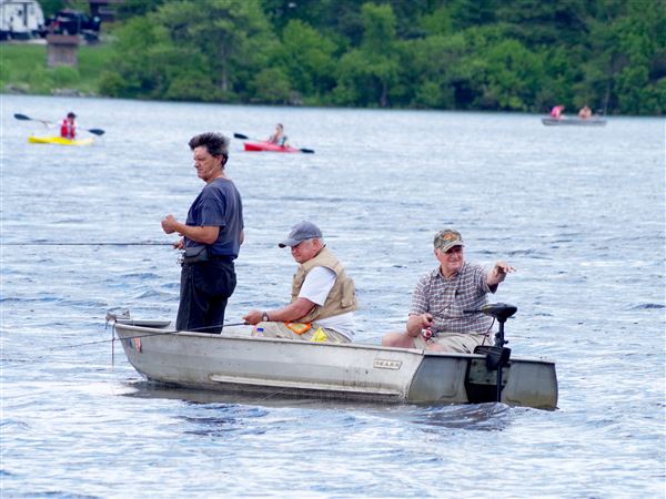 Electric trolling motors are standard equipment on a lot of small fishing boats, like this one seen in Promised Land State Park in Pike County.  