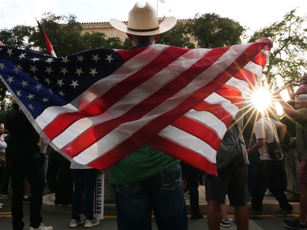 Anti-ICE protesters in downtown San Antonio recently. Adriana Ramirez wonders if she leave America now, before she gets deported for getting arrested as a 19-year-old.