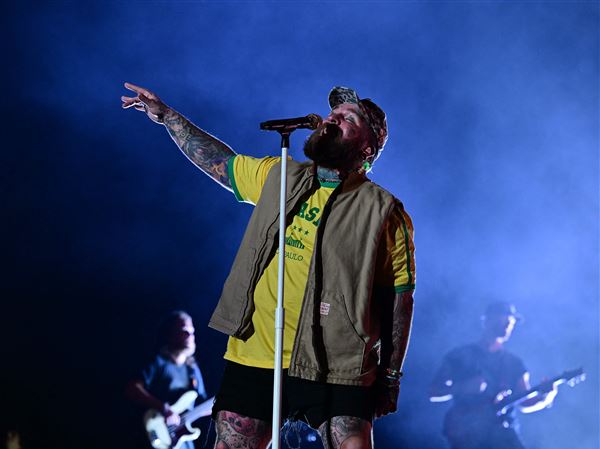 Teddy Swims, shown performing at Lollapalooza in March, plays Stage AE on Saturday.