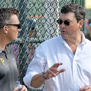 Pirates team owner Bob Nutting talks with general manager Ben Cherington during spring training Monday, Feb. 17, 2020, at Pirate City in Bradenton, Fla. 