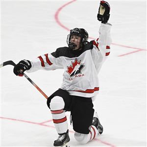 Gavin McKenna of Canada celebrates his 4-6 empty net goal and hat trick during the 2024 IIHF ice hockey U18 world championships final match between the United States and Canada in Espoo, Finland, Sunday, May 5, 2024.