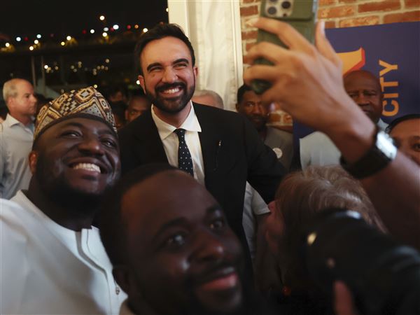 Democratic mayoral candidate Zohran Mamdani takes selfies with supporters after speaking at his primary election party on Wednesday, June 25.