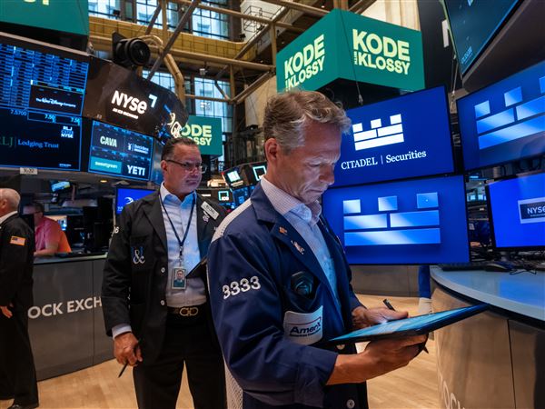 Traders work on the floor of the New York Stock Exchange (NYSE) on Wall Street on Monday, July 7, 2025, in the Financial District neighborhood of New York City’s Manhattan borough.